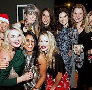 Staff Christmas party colleagues celebrating together