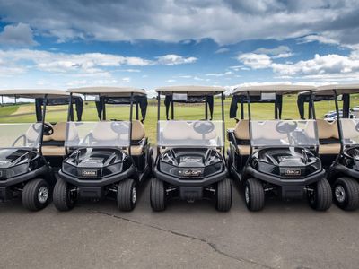 Corporate golf day buggies at premium venue